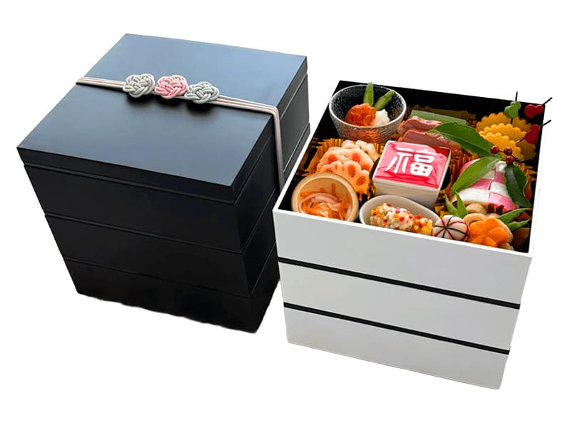 Фото прямоугольной многоуровневой коробки дзюбако для еды 